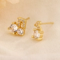 Sparkling note shaped stud earrings in gold finish with micro-paved cubic zirconia - Gold