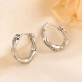 Elegant Mobius S925 sterling silver hoop earrings with a twisted irregular design for women - Irregular Twisted Loop (HL-106)