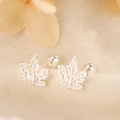 Silver maple leaf cartilage earrings with screw back on natural linen fabric backdrop - Silver Maple Leaf Style (C260)