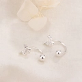 Elegant silver butterfly stud earrings with sparkling cubic zirconia on a beige fabric - Silver Butterfly Zirconia Screw Back Stud Earrings (C275)