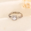 Elegant silver square zircon open ring on soft fabric background with yellow flowers - Square Halo Style (B57)