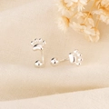 Minimalist silver cat paw stud earrings with secure screw back on a soft textured background - Silver Cat Paw Style (C284)
