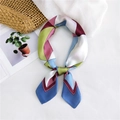 Pink and green geometric pattern silk scarf tied in a stylish neckerchief style - Blue Triangle Patchwork