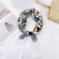 Ivory cotton-linen scarf featuring yellow jungle prints styled as a stylish neck tie - 1 Cotton Animal Council White