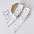 Blue tie-dye cooling sun sleeves with white elastic cuff and Fashion Rush logo text - 2 Ink Circle Green