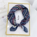 Dark blue cotton linen square scarf with white stars and colorful stripes tied in a bow - 36 Cotton Color Stripe Stars