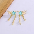 Boucles d'oreilles étoile avec cristaux bleu clair et franges en chaîne dorée - Doré