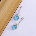 Orecchini pendenti in argento S925 con zircone azzurro e dettagli in cristallo - Argento Zirconia Blu