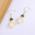 Lotus Hetian jade style enamel gradient earrings with square stones on wood background - Gold