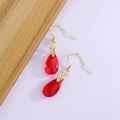 Elegante chinesische rote Karneol-Ohrringe mit goldenen Blättern und langen Quasten - Gold
