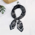 Elegant black and white paisley silk scarf with abstract floral print and smooth texture - Black Floral Paisley