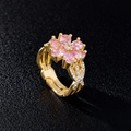 Eleganter Goldring mit rosa Kristallblüten und verstellbarem S925 Silberband - Gold Rosa - Kleine Blume Ring