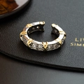 Eleganter Silberring mit goldenem X-Motiv und Zirkonia-Pflasterung im offenen Design - Ring (Strass/Offen)