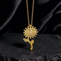 Exquisito collar con colgante de girasol dorado y pavé de circonitas en fondo negro - Estilo Dorado Girasol Zirconia (H)