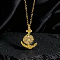 Detalle del colgante de ancla bañado en oro con circonitas sobre base de piedra negra - Estilo Dorado Ancla Zirconia (K1)