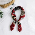 Red leopard print silk scarf with mixed animal patterns in a knotted ring style - Red Leopard Print