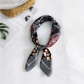 Red leopard and animal print silk twilly scarf styled on a minimalist backdrop - Grey Leopard