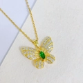 Golden butterfly necklace with white rhinestones and an emerald green center stone - Emerald Gem Butterfly Style (N)