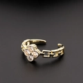 Adjustable gold plated clover ring featuring clear cubic zirconia on a black background - Adjustable Open / Gold with White Zirconia (B)