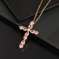 Cross necklace with pear-shaped pink cubic zirconia in gold plated setting - Pink Gemstone