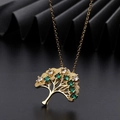 Gold-plated tree of life necklace featuring green and clear zircon stones on black background - Tree Shape Green/White Diamond Style (H)