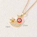Macro view of gold crescent moon necklace with red evil eye and star detail - Crescent Moon Star Evil Eye Style (B)