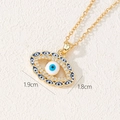 Detailed macro view showing the 1.9cm by 1.8cm evil eye pendant dimensions and zircon stones - Oval Pave Evil Eye Style (F)