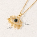 Detail view of gold evil eye pendant showing 2.4cm size and zircon star accents - Eyelash Eye Style (D)