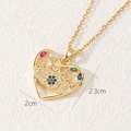 Detail of gold heart pendant with evil eye zircon inlay and 2.3cm height measurement - Heart Evil Eye Style (I)