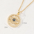 Detail of bohemian gold evil eye pendant showing 2.7cm height and 2cm width dimensions - Spoke Sunburst Style (O)
