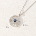 Detailed view of evil eye pendant with blue gemstone and white zircons showing 2cm diameter - Silver Spoke Style (P)