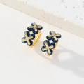 Détail de boucles d'oreilles trèfle vintage dorées 18K avec zircons bleus fins - Style Vintage à Double Fleur Bleue (I)