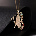 Collier papillon doré avec des pierres en zircon colorées sur fond de cuir noir - Papillon asymétrique multicolore pastel (R)
