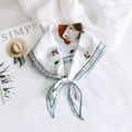 Diamond-shaped silk scarf featuring cartoon girl and floral print on a white background - Cotton Girl White
