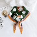 Green diamond silk scarf with cartoon girl print and orange border tied as a bow - Cotton Girl Green