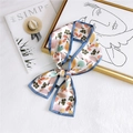 Floral print satin neckerchief tied in a bow with light blue border and cream base - Brown Fruit Blue