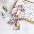 Pink floral satin skinny scarf with abstract pattern tied in a knot on white fabric - Curtain Buckle Pink