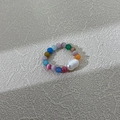 Handmade beaded ring with colorful cat eye stones and a white baroque pearl focal point - Multi-color