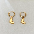 Polished golden heart pendant hoop earrings featuring a thick minimalist metal design - Solid Heart Style