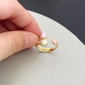 Verstelbare gouden roestvrijstalen ring met drie pastelkleurige emaille ovalen in spiraalvorm - Goud met meerkleurig emaille