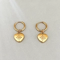 Gold hoop earrings with engraved heart charms in a minimalist bohemian style for women - Starburst Engraved Heart Style