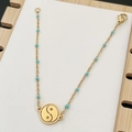 Bracciale dorato con perline turchesi e ciondolo a forma di Tai Chi Yin Yang - Verde