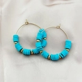 Bohemian style hoop earrings featuring blue polymer clay beads and gold steel circles - Sky Blue
