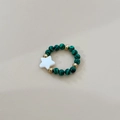 Elastic beaded green malachite ring featuring a white star charm and golden accents - Malachite Green Star Style / Green