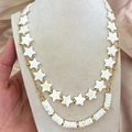 Double-layered vintage star beaded necklace with gold finish on jewelry bust - Star Double Layer Necklace (Gold/White)