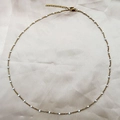 Vintage stainless steel gold chain necklace featuring delicate white enamel beads - White