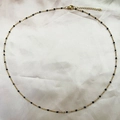 Minimalist gold necklace with black enamel beads on a polished stainless steel chain - Black
