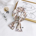Pink daisy print narrow twill silk scarf tied elegantly on fashion magazines - Dandelion Pink