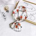 Ivory silk twilly scarf with orange tulips and black polka dots in a bow style - Tulip Green