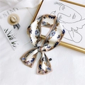 Floral print narrow silk scarf in navy and caramel brown with polyester care label - Jungle Frame Camel